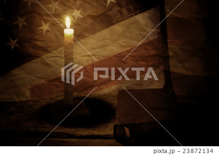Old US flag and book. Old US flag and book. 23872134