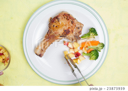 Chef decorated pork chop steak 23873939