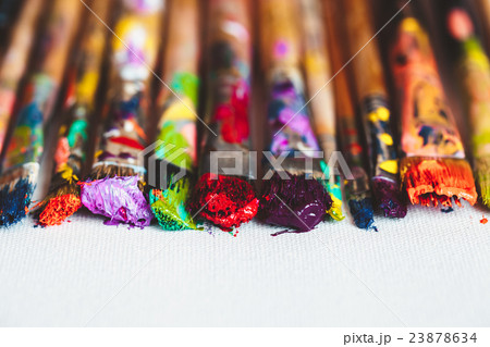 Artist paintbrushes closeup on artistic canvas. 23878634