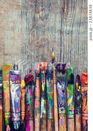Row of artist paint brushes closeup Row of artist paint brushes closeup 23878636
