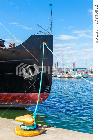 The bow of a icebreaker ship on a dock 23880822