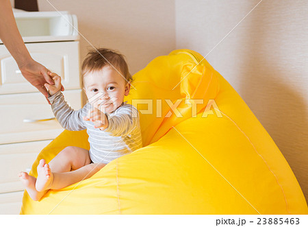 Beautiful adorable laughing baby boy infant face 23885463