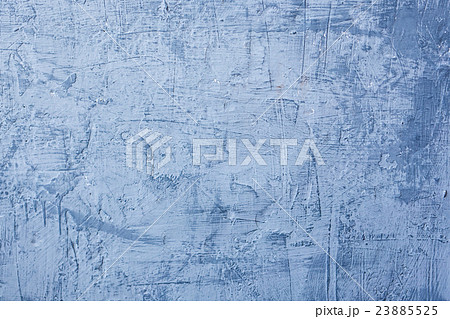 closeup of a blue colored plastered wall. 23885525