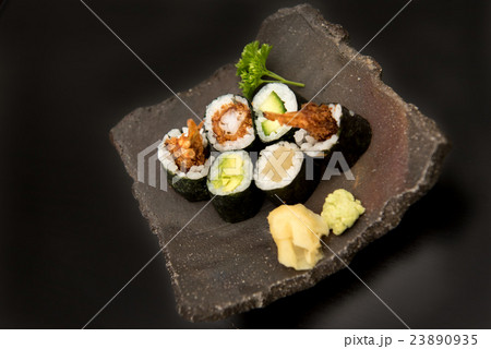 Sushi maki rolls with salmon, avocado and prawns Sushi maki rolls with salmon, avocado and prawns 23890935