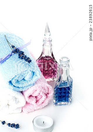 colorful stones and towel on a white background 23892615
