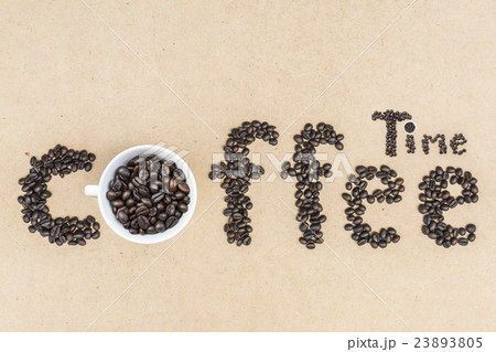 Coffee cup and coffee bean on a wooden 23893805