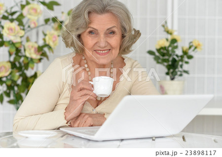 Senior woman with laptop Senior woman with laptop 23898117