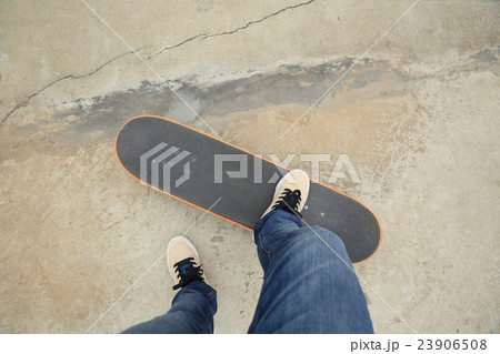 skateboarding legs at skatepark 23906508