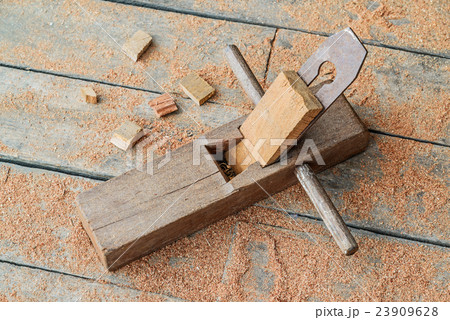 Old wooden carpenter hand plane on wooden. 23909628
