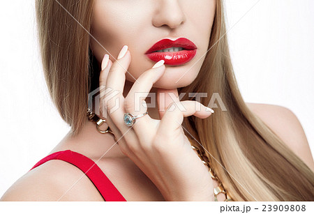 Close-up portrait of woman with red full lips as 23909808