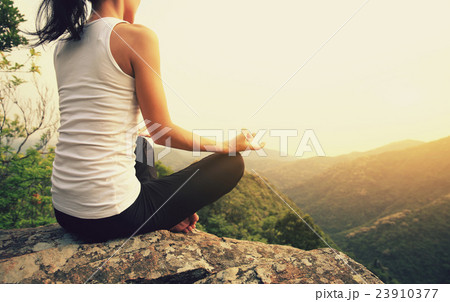 young fitness yoga woman at mountain peak young fitness yoga woman at mountain peak 23910377