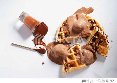 waffles with chocolate sauce. 23916147