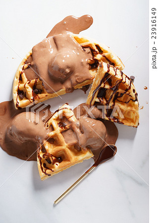 waffles with chocolate sauce. 23916149