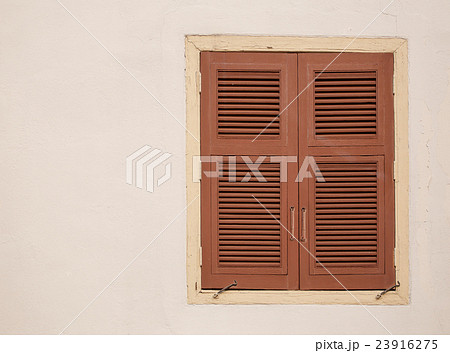 Wood windows on the white wall Wood windows on the white wall 23916275
