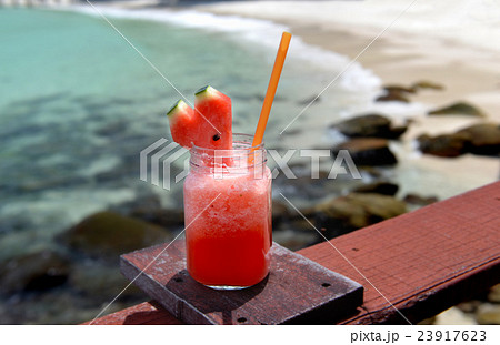 Watermelon smoothie in glass bottle 23917623