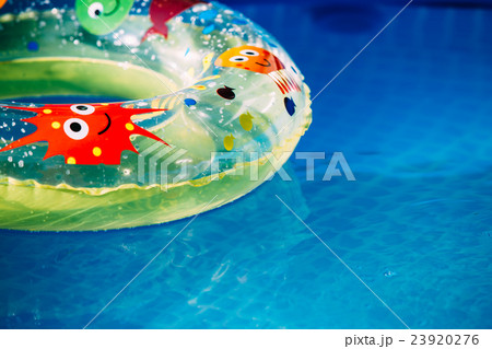 Inflatable swimming circle in open air pool in 23920276