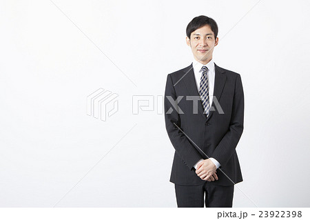 手を組むビジネスマンの写真素材