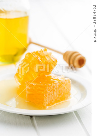Fresh honey with honeycomb. 23924752