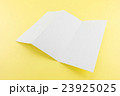 Blank Trifold white template paper on yellow background with soft shadows. 23925025