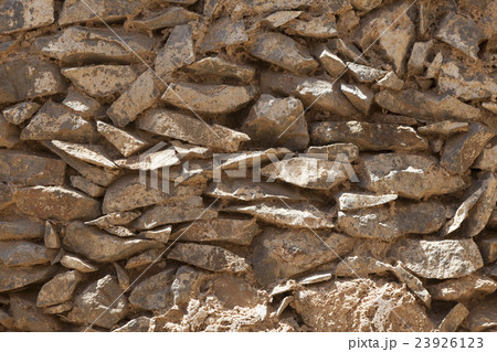 Wall from large stone textured basalt.  23926123