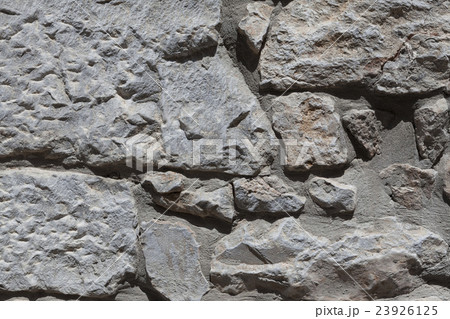 Wall from large stone textured basalt.  23926125