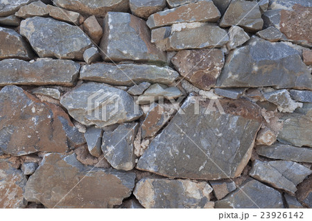 Wall from large stone textured basalt. Wall from large stone textured basalt. 23926142