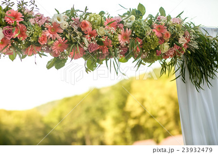 The wedding archway with flowers 23932479