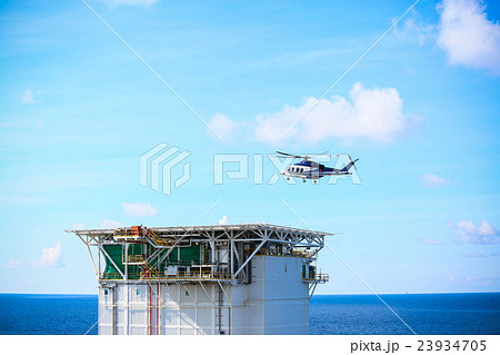 helicopter parking landing on offshore platform 23934705