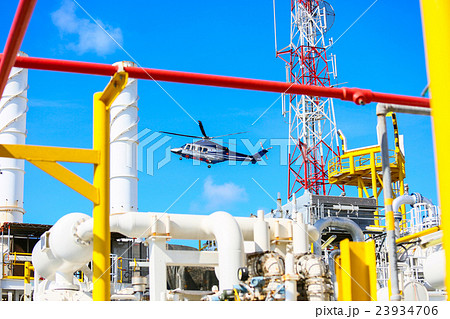 helicopter parking landing on offshore platform 23934706
