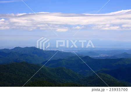 真夏の無意根山から見る札幌近郊の山並みと札幌市街地の写真素材