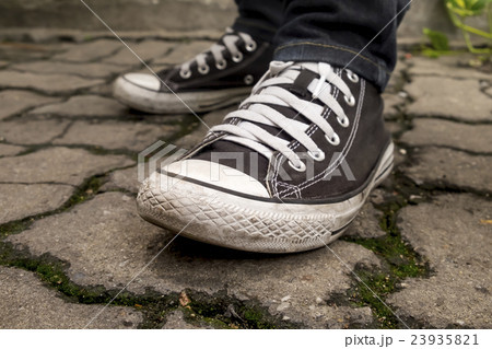 closeup black sneakers 23935821