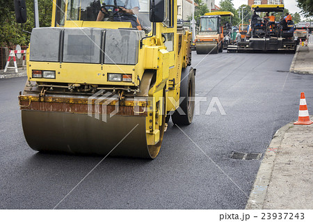 Compactor roller during road construction Compactor roller during road construction 23937243