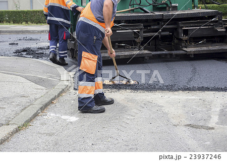 Workers on Asphalting road 23937246
