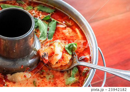Spicy tom yum goong Thai style in the hot pot Spicy tom yum goong Thai style in the hot pot 23942182