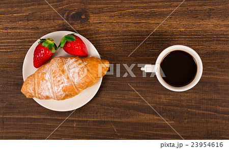 Continental breakfast with croissant Continental breakfast with croissant 23954616