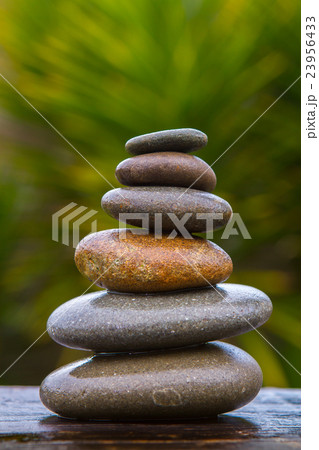 stack of round smooth wet pebbles stack of round smooth wet pebbles 23956433