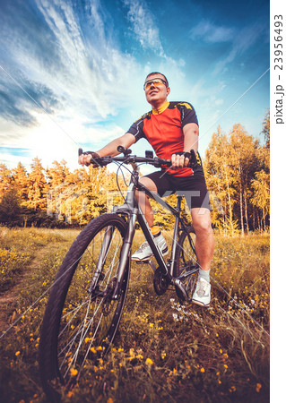 man with bike enjoy summer vacation 23956493