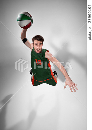 Full length portrait of a basketball player with 23960102