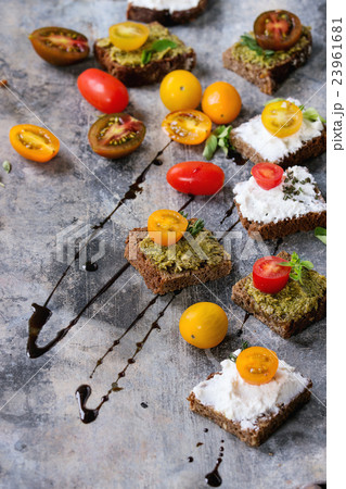 Small sandwiches with tomatoes Small sandwiches with tomatoes 23961681