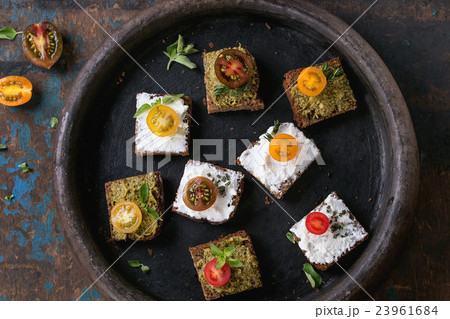 Small sandwiches with tomatoes Small sandwiches with tomatoes 23961684