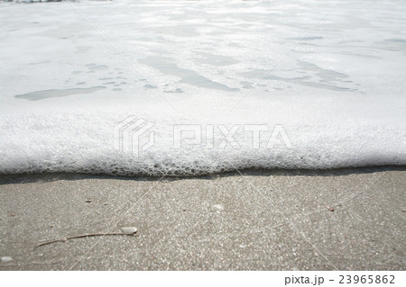 Wave of the sea on the sand beach  23965862