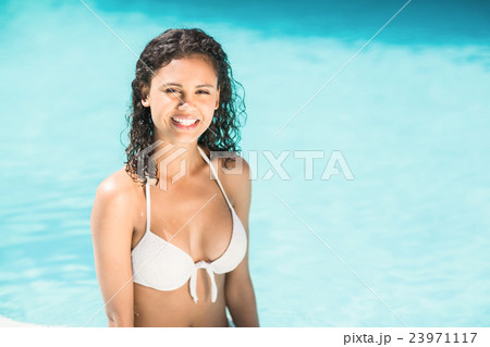 Portrait of beautiful woman in swimming pool Portrait of beautiful woman in swimming pool 23971117