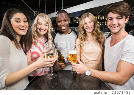 Group of friends toasting with beer and wine 23973455