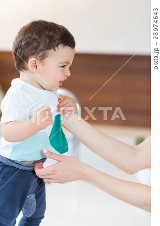 woman holding cute baby boy 23974643