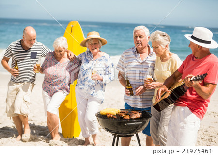 Seniors dancing to the music of a guitar 23975461