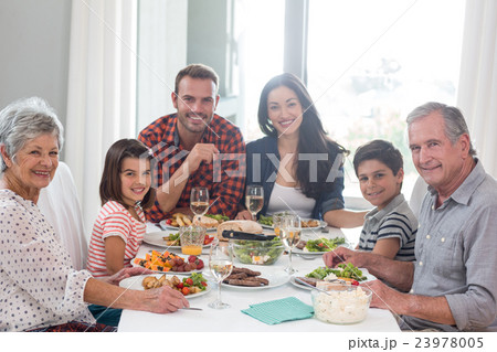 Family together having meal 23978005