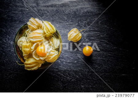 Closeup orange organic cape gooseberries Closeup orange organic cape gooseberries 23979077