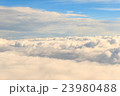heavenly view high above the clouds 23980488