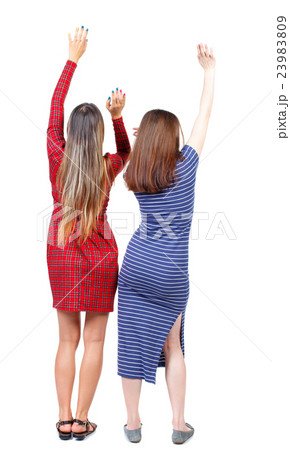 Back view of two dancing young women Back view of two dancing young women 23983809