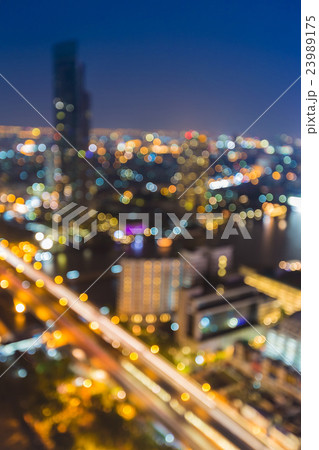 Night blurred lights, city and road downtown Night blurred lights, city and road downtown 23989175